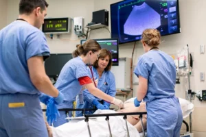 Doctors and nurses collaborating to provide medical treatment.