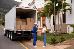 HC driver jobs in Brisbane delivery driver handing package to woman